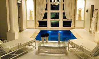 Imagem 7: Casa de condomínio para venda tem 1000 metros quadrados com 5 quartos