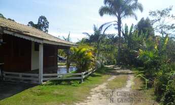 Imagem 4: Chácara 4.500 m², com belas casas de madeira e piscina..