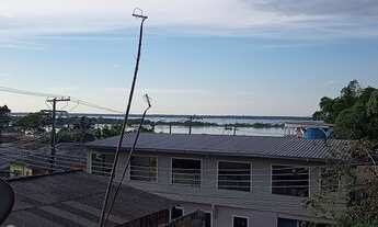 Imagem 6: Duas casas próx.ao rio