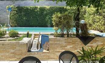 Imagem 3: Casa Padrão de 2/4 com 1 suíte de 110 m², terreno de 300 m², piscina, 4 vagas por 590.000