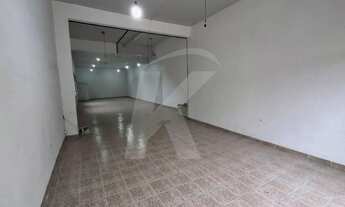 Imagem 6: Salão comercial com 1 banheiro, porta de aço e 1 vaga de garagem