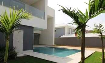 Imagem 3: Casa de condomínio para venda possui 750 metros quadrados com 5 quartos