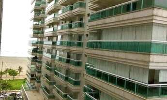 Imagem: PÉ NA AREIA COM VISTA PARCIAL PARA O MAR