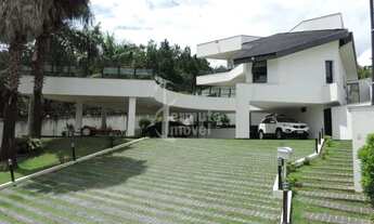 Imagem 3: Casa para alugar com 798 m², 4 suítes, sala de estar, cozinha e 5 vagas de garagem no Resi