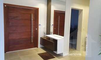 Imagem 2: Casa de alto padrão para venda ou locação em condomínio fechado com quatro suítes no bairr