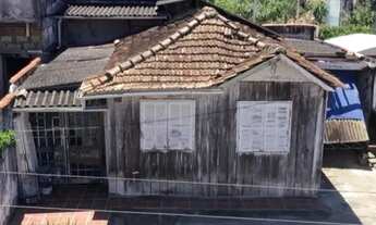 Imagem 2: Terreno com casa mista