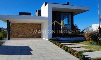 Imagem 2: Casa térrea com 178m² sendo 3 suítes e garagem para 2 carros no Condomínio Reserva das Águ