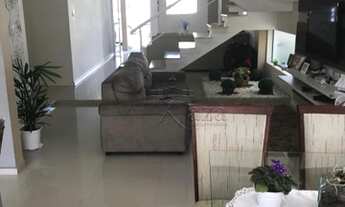 Imagem 3: Casa de condomínio para venda tem 340 metros quadrados com 4 quartos