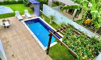 Imagem 2: Casa toda nascente com 4/4 + piscina com área de apoio no condomínio Granville