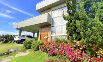 Imagem 2: Casa luxuosa e charmosa com 03 dormitórios, localizada em condomínio fechado