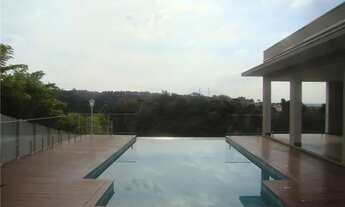 Imagem 5: Casa Nova 4 suítes, piscina com borda infinita. Condomínio Residencial dos Lagos