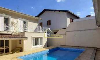 Imagem: Bela casa com 3 suítes, piscina e churrasqueira