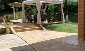 Imagem 4: Casa de condomínio para venda possui 600 metros quadrados com 6 quartos