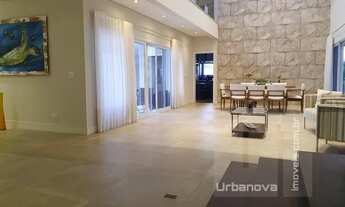 Imagem 3: Casa de alto padrão para venda ou locação em condomínio fechado com quatro suítes no bairr