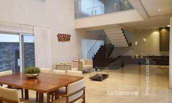 Imagem 5: Casa de alto padrão para venda ou locação em condomínio fechado com quatro suítes no bairr