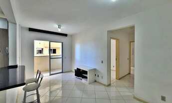 Imagem 4: Apartamento com 2 dormitórios, sala, sacada, banheiro social e cozinha, garagem rotativa