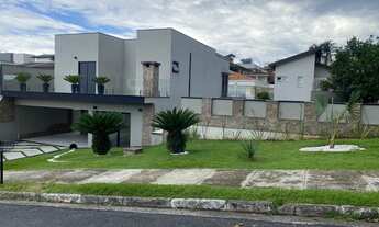 Imagem 5: Casa de condomínio para venda possui 360 metros quadrados com 4 quartos, sendo 4 suítes