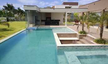 Imagem 2: Casa de condomínio para venda possui 600 metros quadrados com 5 quartos