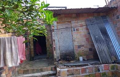 Imagem 4: Duas casas próx.ao rio