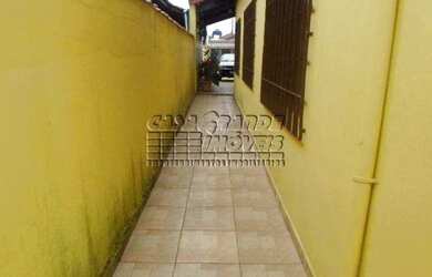 Imagem 2: Casa para venda possui 150 metros quadrados com 3 quartos em Maracanã - Praia Grande - SP