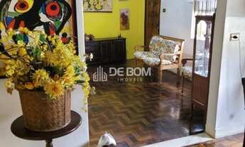 Imagem 2: Casa à venda no bairro Vila Nova, com três dormitórios, dois banheiros, sala de estar e de