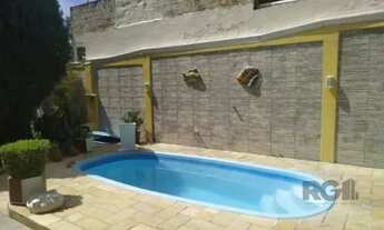 Imagem 2: Casas com total de 3 dormitórios, 2 banheiros, 2 vagas de garagem no Bairro Jardim Carvalh