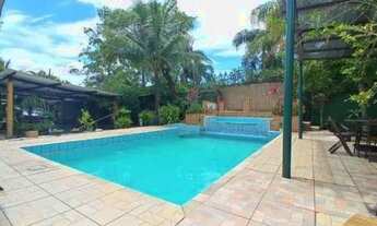 Imagem 2: Chácara na praia com 10 quartos, piscina, playground. Aceita financiamento bancário