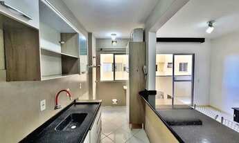 Imagem 2: Apartamento com 2 dormitórios, sala, sacada, banheiro social e cozinha, garagem rotativa