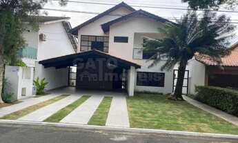 Imagem 2: Casa de condomínio para venda possui 300 metros quadrados com 4 quartos