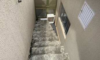 Imagem 3: Casa com quitinetes ao fundo, próximo a rodoviária