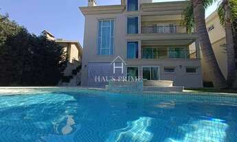 Imagem 1: Casa de Condomínio para alugar em Tamboré de 695.00m² com 4 Quartos, 4 Suites e 4 Garagens