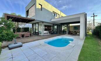 Imagem: Casa mobiliada com 4 suítes e piscina à