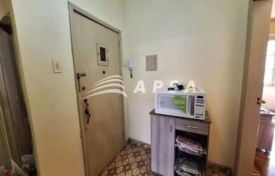 Imagem 12: NO CORAÇÃO VIBRANTE DO CENTRO DO RIO, ESTE CHARMOSO APARTAMENTO MOBILIADO PARA ALUGUEL É A