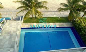 Imagem 6: Casa pé na areia com arquitetura exclusiva, 6 suítes, disponível para venda ou locação em