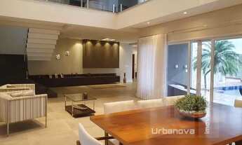 Imagem 4: Casa de alto padrão para venda ou locação em condomínio fechado com quatro suítes no bairr