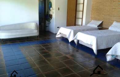 Imagem 3: Casa de condomínio para aluguel e venda possui 500 metros quadrados com 6 quartos