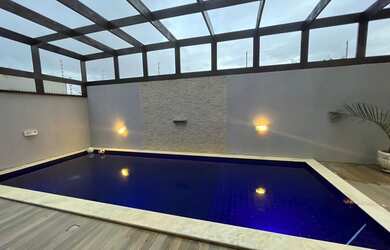 Imagem 6: Casa com 4 suítes, piscina com área de apoio, muito espaço e conforto para toda a família