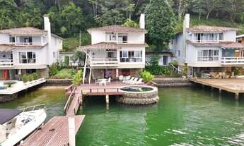 Imagem 2: Casa costeira com praia privativa, piscina, deck molhado, 7 quartos