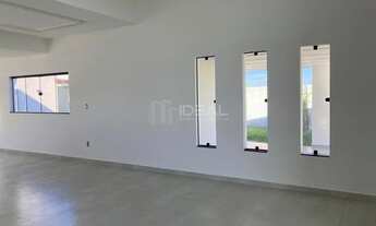 Imagem 6: Casa linear de alto padrão com piscina e vista para o jardim