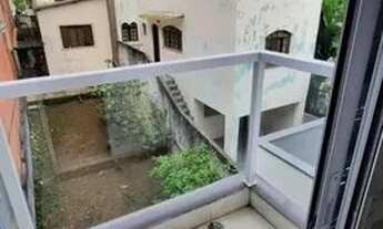 Imagem 2: Apartamento com 2 dormitórios para alugar, 54 m² por R$ 2.200,00/mês - Santa Maria - Santo