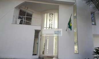 Imagem 4: Moderna, clean, ensolarada,muita iluminação natural, 4 suítes, piscina, churrasqueira, ent