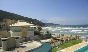 Imagem 2: TRIPLEX BEIRA MAR COM 4 DORM. EM CONDOMINIO COM PISCINA E ÓTIMO VALOR