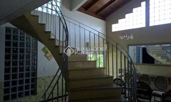 Imagem 5: Casa de condomínio para venda tem 220 metros quadrados com 3 quartos