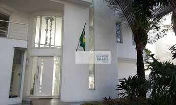 Imagem 5: Moderna, clean, ensolarada,muita iluminação natural, 4 suítes, piscina, churrasqueira, ent