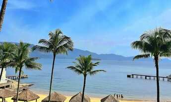 Imagem 3: Casa verde Pé na areia