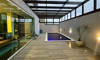 Imagem 2: Casa com 4 suítes, piscina com área de apoio, muito espaço e conforto para toda a família