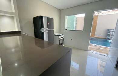 Imagem 7: Sobrado para venda possui 249 metros quadrados com 3 quartos em Caiçara - Praia Grande - S