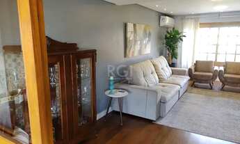 Imagem 3: Excelente casa com 03 suíte, espaço gourmet com churrasqueira, living com lareira, pátio c