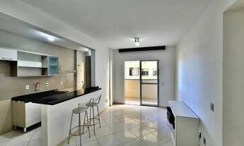 Imagem 3: Apartamento com 2 dormitórios, sala, sacada, banheiro social e cozinha, garagem rotativa