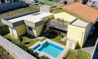 Imagem 2: Casa de condomínio térrea para venda tem 280 metros quadrados com 4 quartos